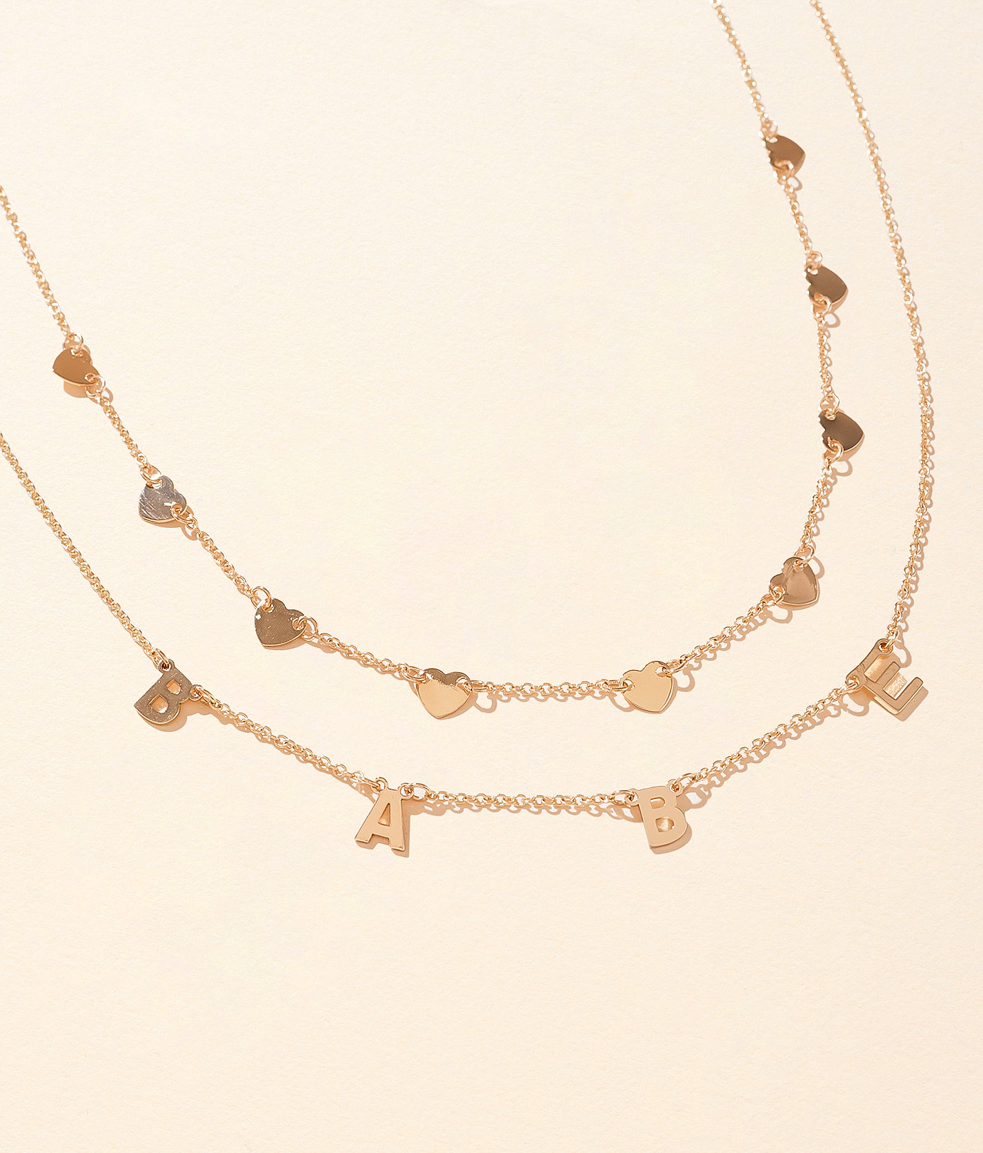 boutique by BKE 2 Pack Babe & Hearts Charm Necklace Set - Women's Jewelry in Gold